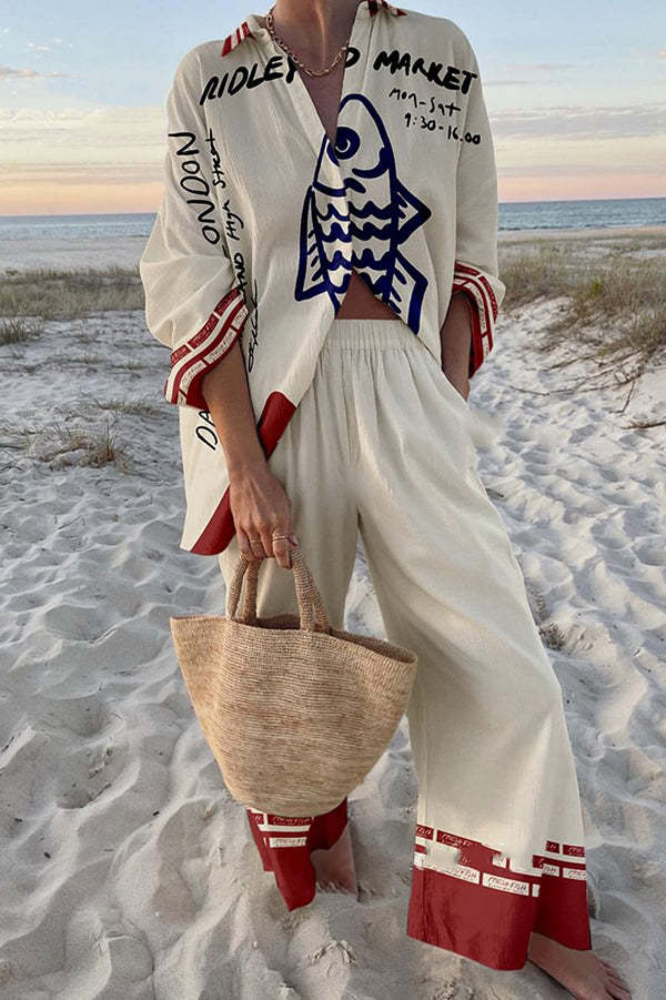 ראונל™ | חליפת לייקרה עם הדפס דגים כחולים